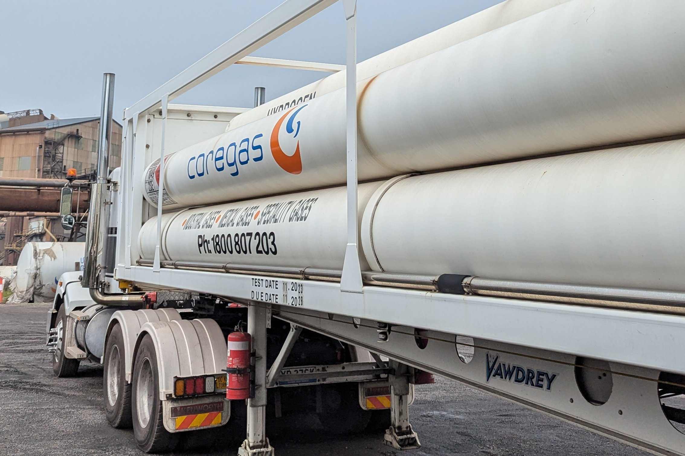 Coregas tube trailer with high-pressure gas cylinders, hitched to a prime mover