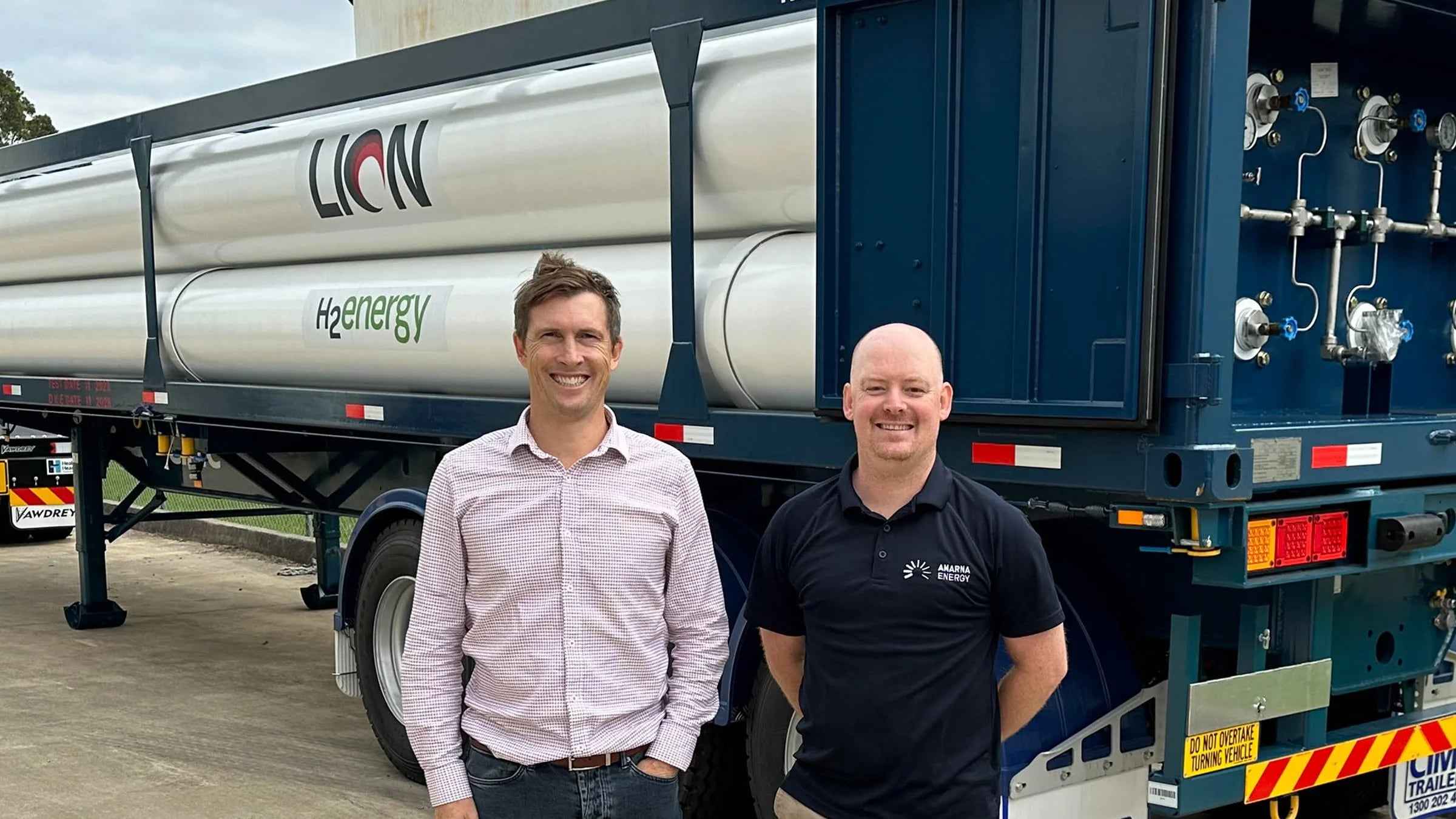 Amarna's Alistair Wardrope and Andrew Lelliott beside a Lion Energy hydrogen tube trailer